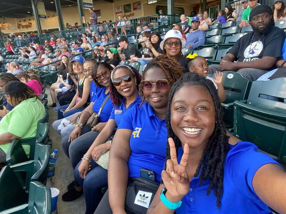 teachers at a baseball game 